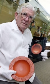 The late Dr Owen Powell with a late Roman plate featured on the front of his translation of Galen’s 'On the Properties of Foodstuffs'