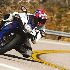 motorcycle, rider, rounding corner; Image via Pixabay, CC0 Public Domain