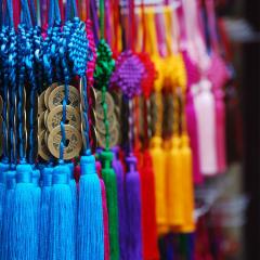 Chinese New Year decorations, hanging coins; Image via Pixabay, CC0 Public Domain