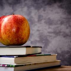 apple on books; Image via Pixabay, CC0 Public Domain